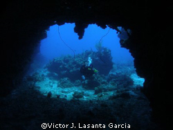 view from in to out of the chimney dive site in parguera ... by Victor J. Lasanta Garcia 